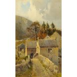 Arthur Tucker (1864-1929), a watercolour "A Corn Mill Eskdale". 27 cm x 16.5 cm, framed, signed.
