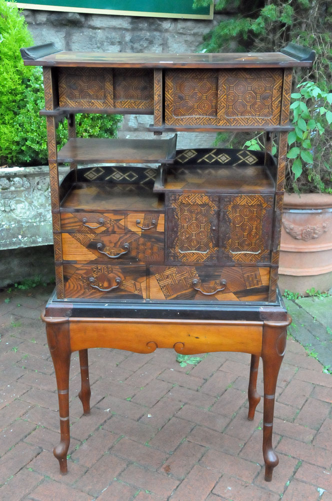 A Japanese parquetry and lacquered tabletop cabinet, raised on a later stand. - Image 4 of 15