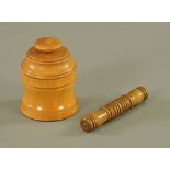 A late 19th century turned fruitwood cylindrical needle case, 8.