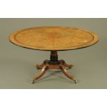 A Regency Pollard oak and parcel ebonised circular breakfast table,