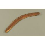 An old Australian aboriginal hardwood boomerang, with crude geometric engraving. 60 cm long.