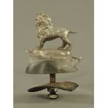 A Victorian silver lion form finial by Edward, John and William Barnard London 1849, on ebony base,