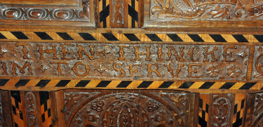 A Victorian carved oak settle, decorated with floral, armorial and religious panels, - Image 15 of 15