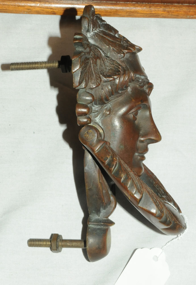 A Victorian bronze door knocker, in the form of a female face. Height 19 cm, width 14 cm. - Image 2 of 4