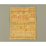 An early 19th century linen alphabet sampler, worked in coloured threads by Mary Glaister.