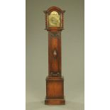 An oak grandmother clock,