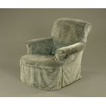 A Victorian armchair, of traditional form,