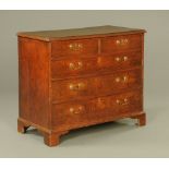 A George III mahogany banded oak chest of drawers,