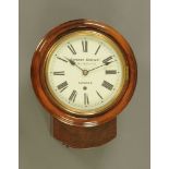 A Victorian mahogany wall clock, the dial marked Camerer Cuss & Co New Oxford Street,
