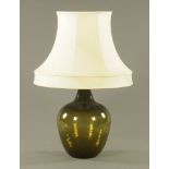 A small green glass carboy table lamp, 82 cm overall.