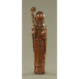 A Chinese carved bamboo figure of Shou-Lao,