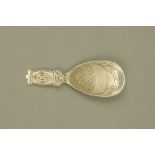 A George V silver caddy spoon by Liberty & Co, of geometric Art Deco inspiration No.