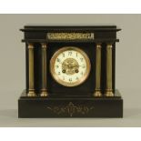 A 19th century French black slate mantle clock by Marti et Cie, of architectural design,