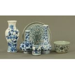 A collection of Chinese porcelain blue and white painted artifacts, including three vases,