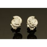 A pair of 18 ct white gold stud earrings, set with diamonds weighing +/- .52 carats.