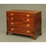 A 19th century mahogany chest of four graduated drawers,