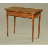 A George III mahogany tea table,