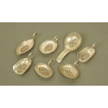 A group of seven George III silver caddy spoons by Samuel Pemberton,