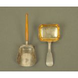A George III silver shovel form caddy spoon, with turned fruitwood handle by Samuel Knight,