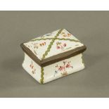 An 18th century white enamel and brass mounted rectangular patch box,