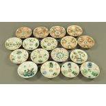A collection of seventeen Chinese polychrome dishes, various, each diameter 14 cm.