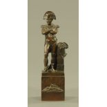 A 19th century dark brown patinated bronze figure of Napoleon, 31 cm high.