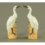 A pair of Chinese porcelain models of cranes, 26 cm high.