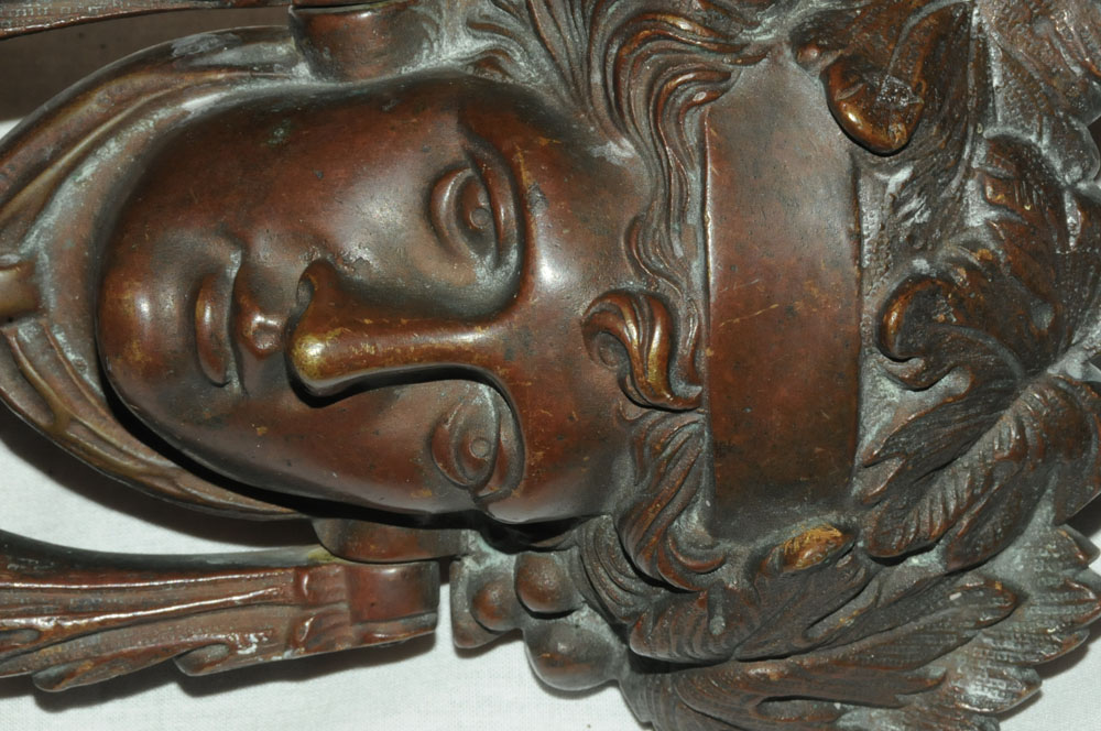 A Victorian bronze door knocker, in the form of a female face. Height 19 cm, width 14 cm. - Image 3 of 4