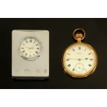 A silver mounted desk clock and a gold plated Waltham pocket watch.