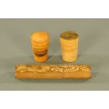 Two Mauchline ware lidded vessels, Edinburgh and Largs, together with a fern patterned case.