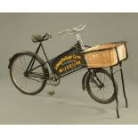 Gundle a vintage shop bike with basket to front and signwritten for Solway Vintage Guns Museum,