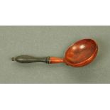 A late 18th/early 19th century finely carved yew wood caddy spoon,