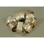 A collection of ten silver napkin rings. 246 grams.