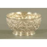 A silver coloured metal bowl, Eastern possibly Chinese repousse with birds. Diameter 10 cm.