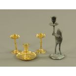 A 19th century polished brass chamberstick, with circular sconce and drip pan, 9 cm high,