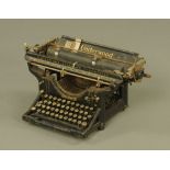 A vintage Underwood typewriter of traditional form.