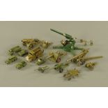 A small selection of model army vehicles and guns, Dinky toys and others.