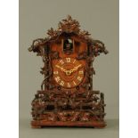 A 19th century Black Forest Cuckoo bracket clock, with two train fusee type movement,