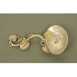 A fine Victorian silver "lily pad and pond" pattern caddy spoon, by Francis Higgins II, London 1857.