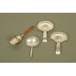 Three George III silver caddy spoons of different design by Wardell & Kempson,