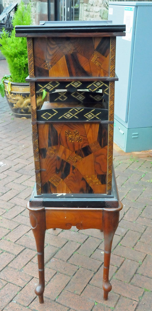 A Japanese parquetry and lacquered tabletop cabinet, raised on a later stand. - Image 5 of 15