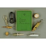 A collection of Boy Scout memorabilia, including "The Hackney Scout Songbook, 8th edition",