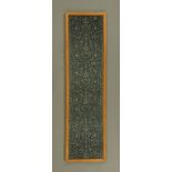 A framed embroidered panel worked in silvered threads,