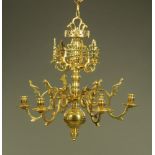 A Victorian brass chandelier, Height excluding suspension chain 60 cm, width 60 cm.