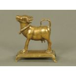 A 19th century Indian brass cow,