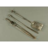 A Harlequin set of 3 19th century polished steel fire implements, comprising tongs,