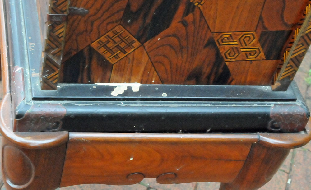 A Japanese parquetry and lacquered tabletop cabinet, raised on a later stand. - Image 9 of 15