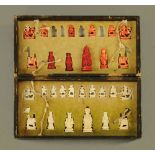 A 19th century Chinese carved bone chess set,