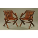 A pair of 19th century dark oak Glastonbury chairs,