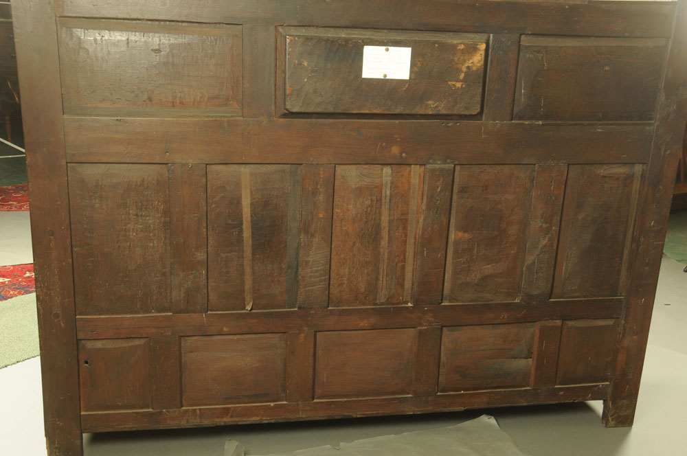 A Victorian carved oak settle, decorated with floral, armorial and religious panels, - Image 11 of 15